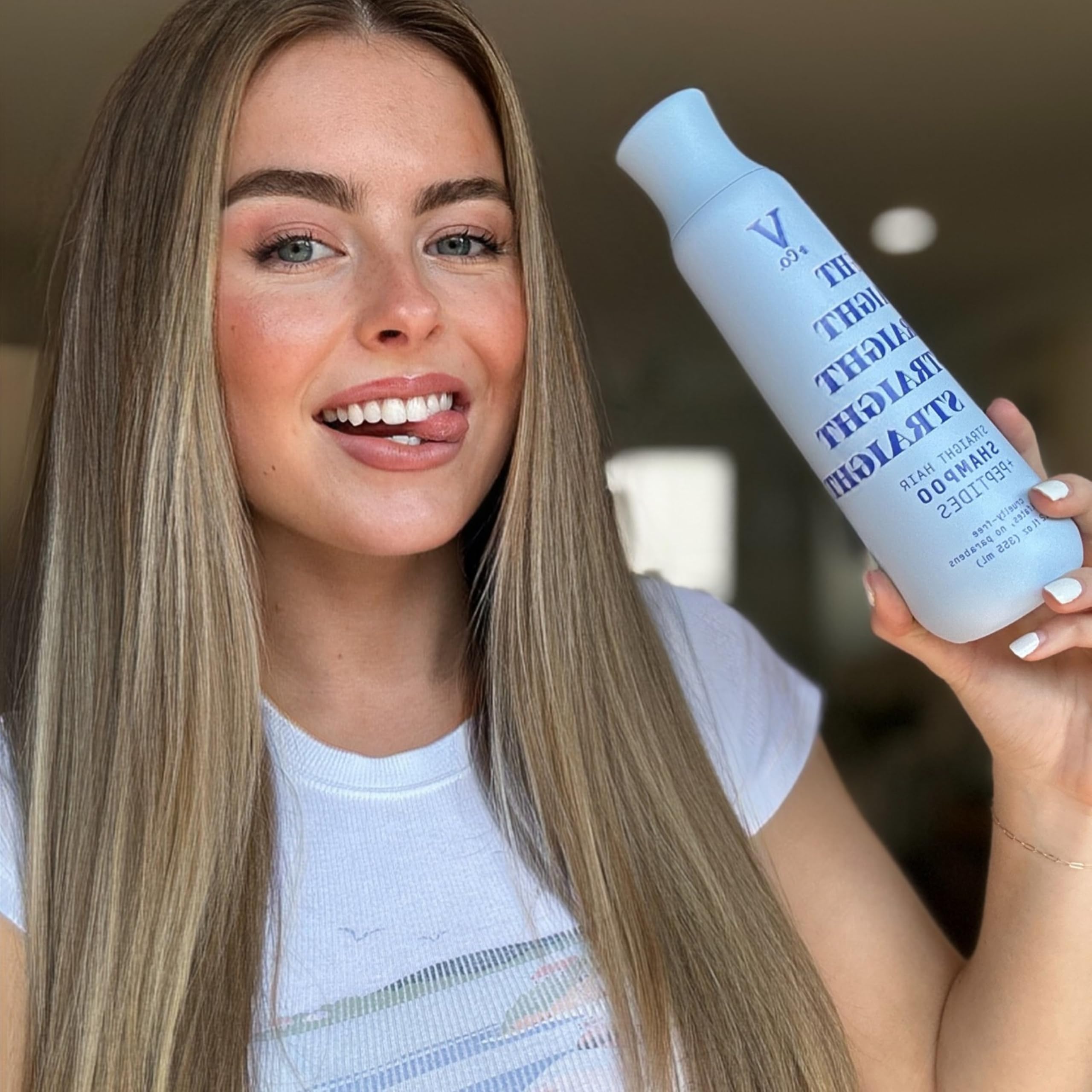 V&Co conditioner applied in shower on straight hair for smoother finish
