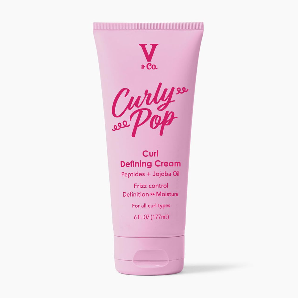 V&CO jar front view showing label and clear branding with benefit of defined curls