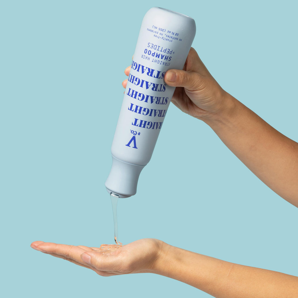 V&Co. label closeup highlighting peptide technology and aloe ingredients for hair benefits