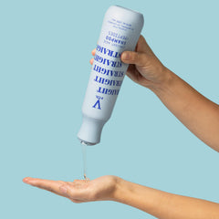 V&Co. label closeup highlighting peptide technology and aloe ingredients for hair benefits