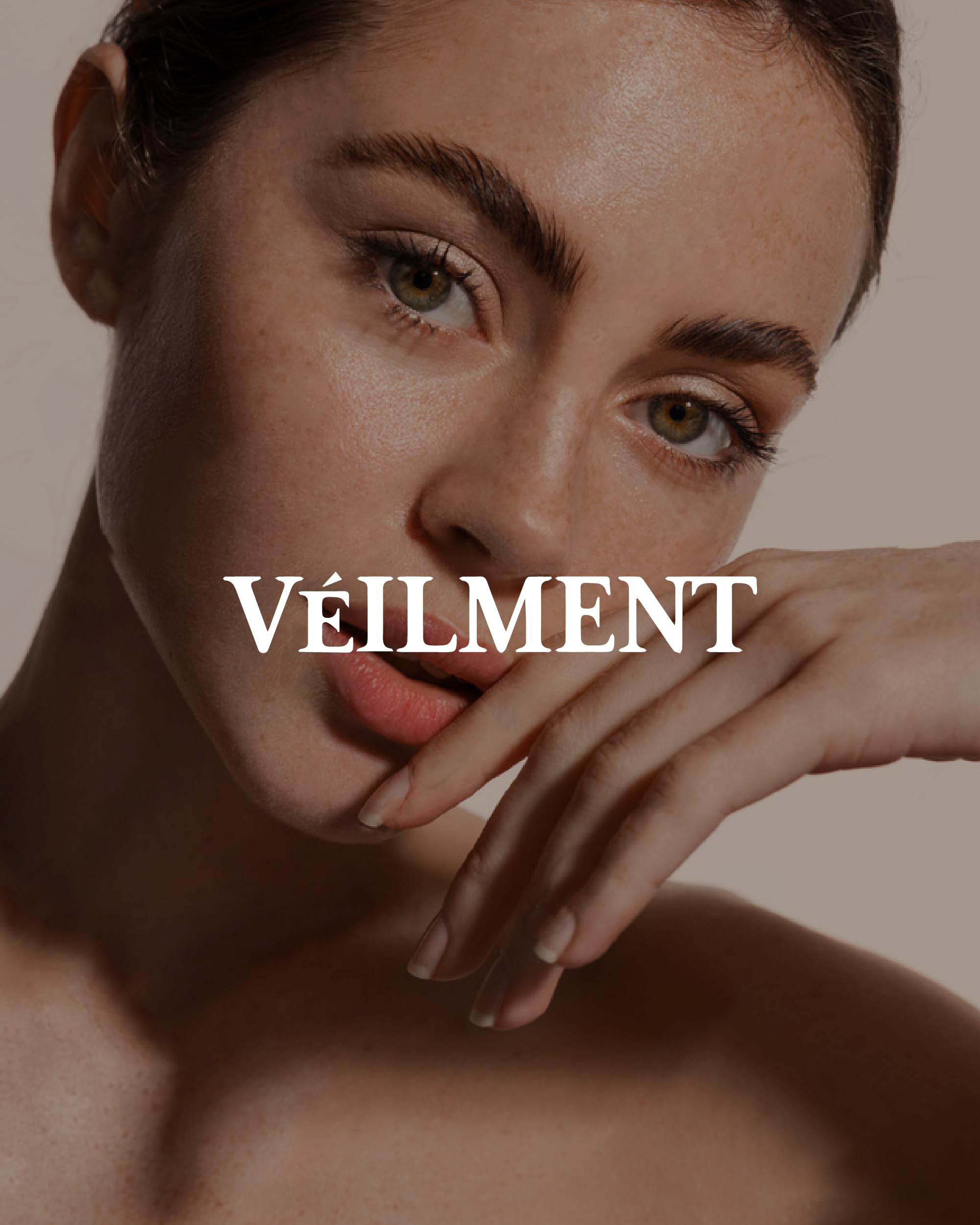 VEILMENT size scale next to hand showing portable two-tube supply benefit
