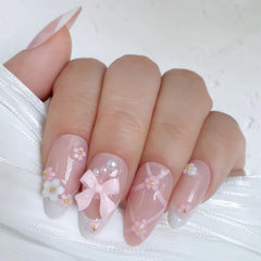 VELINNA close-up of 3D bow and pearl accents showcasing textured elegance