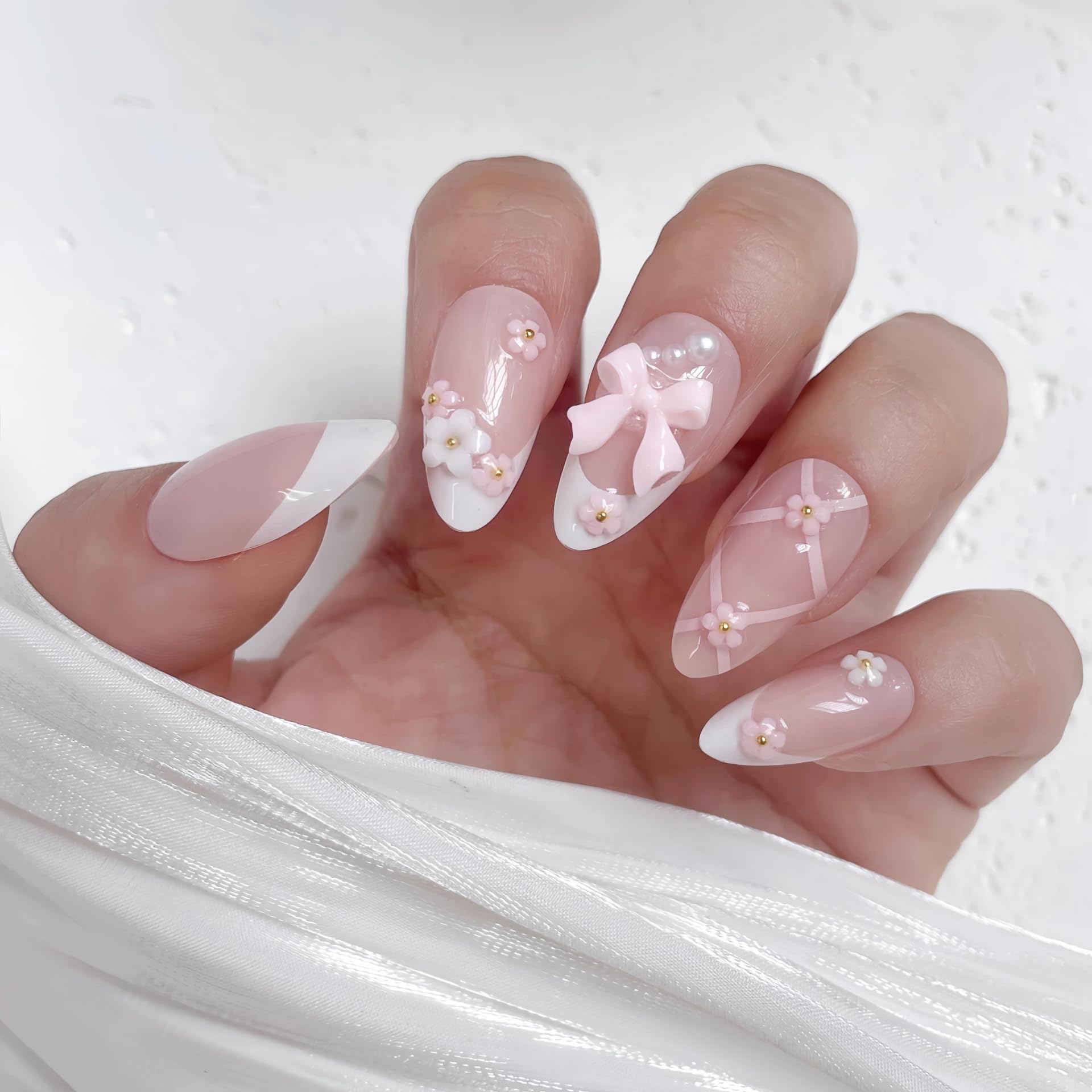 VELINNA lifestyle shot of bridal hand wearing nails for photo-ready style