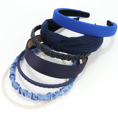 VELSCRUN front view of seven navy headbands showing variety and wearability