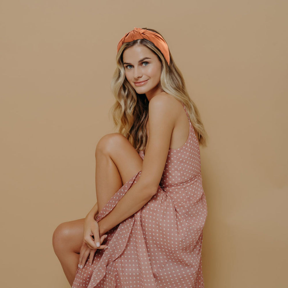 VELSCRUN headbands in gift wrap staged on table showing ready-to-gift appeal