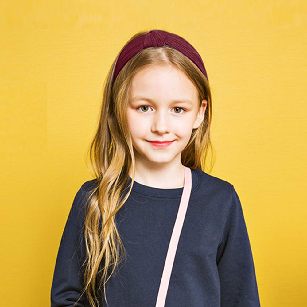VELSCRUN model wearing headband illustrating everyday styling and comfort