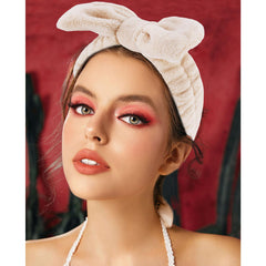 VELSCRUN headband worn front view on model keeping hair back for easy skincare