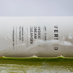 Versed cleanser in hand applying to face demonstrating gentle spreadability and comfort