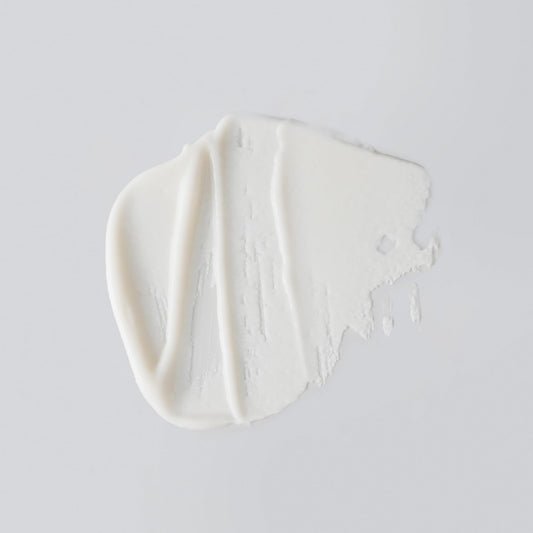 Versed Day Maker creamy microcrystal texture close-up highlighting gentle polish action