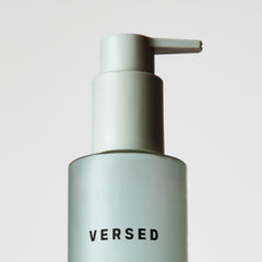 Versed Purist bottle on bathroom counter during routine, conveying simple everyday use benefit