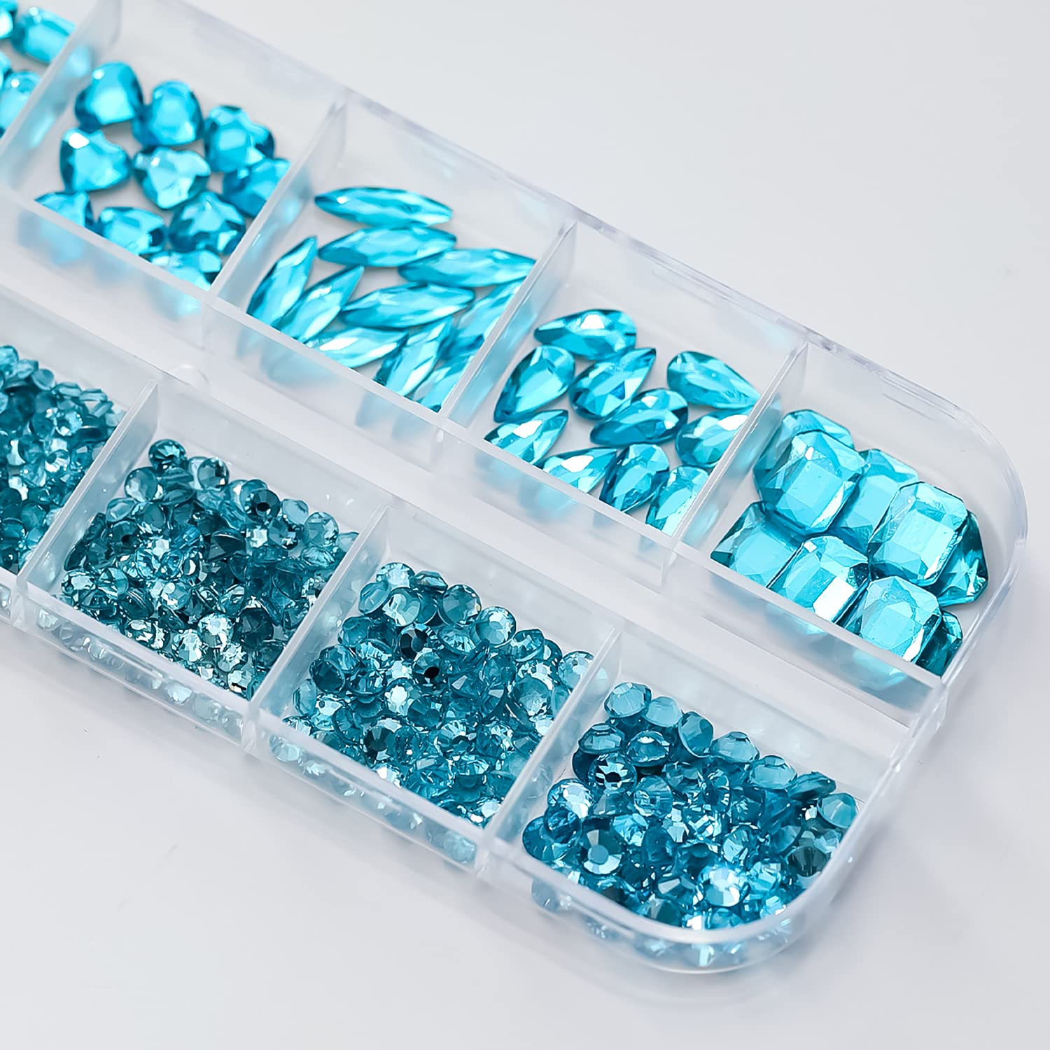 Vezocim rhinestones applied to a manicure showcasing secure adhesion and style