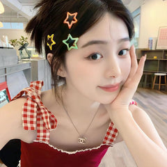 VIBILIA clip used as braid accent, adds playful style