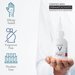 Vichy bottle in hand for scale showing one fluid ounce portability benefit