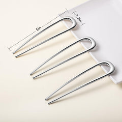 Vigorpace pins anchoring a bun offering long-lasting stability and comfort