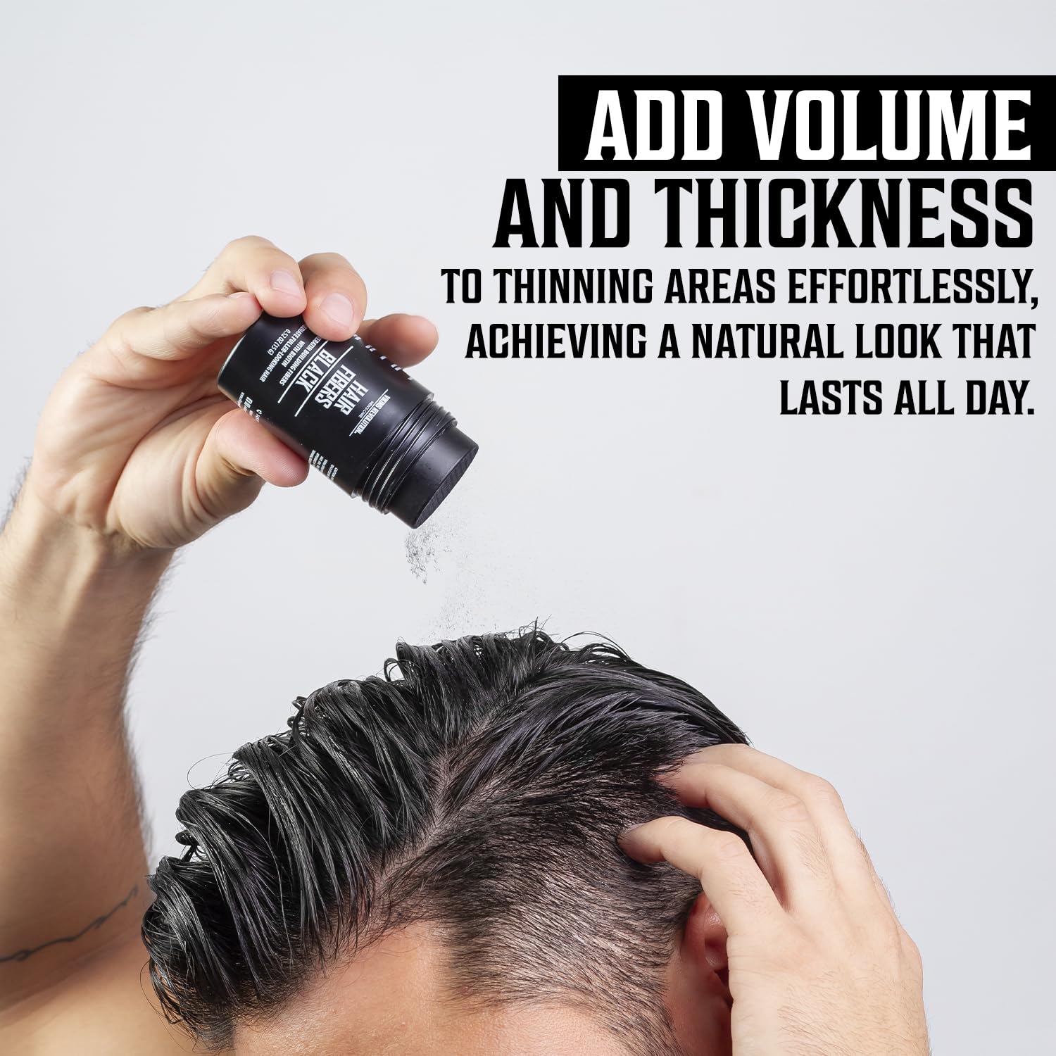 Viking Revolution applying fibers to thinning area demonstrating instant coverage benefit