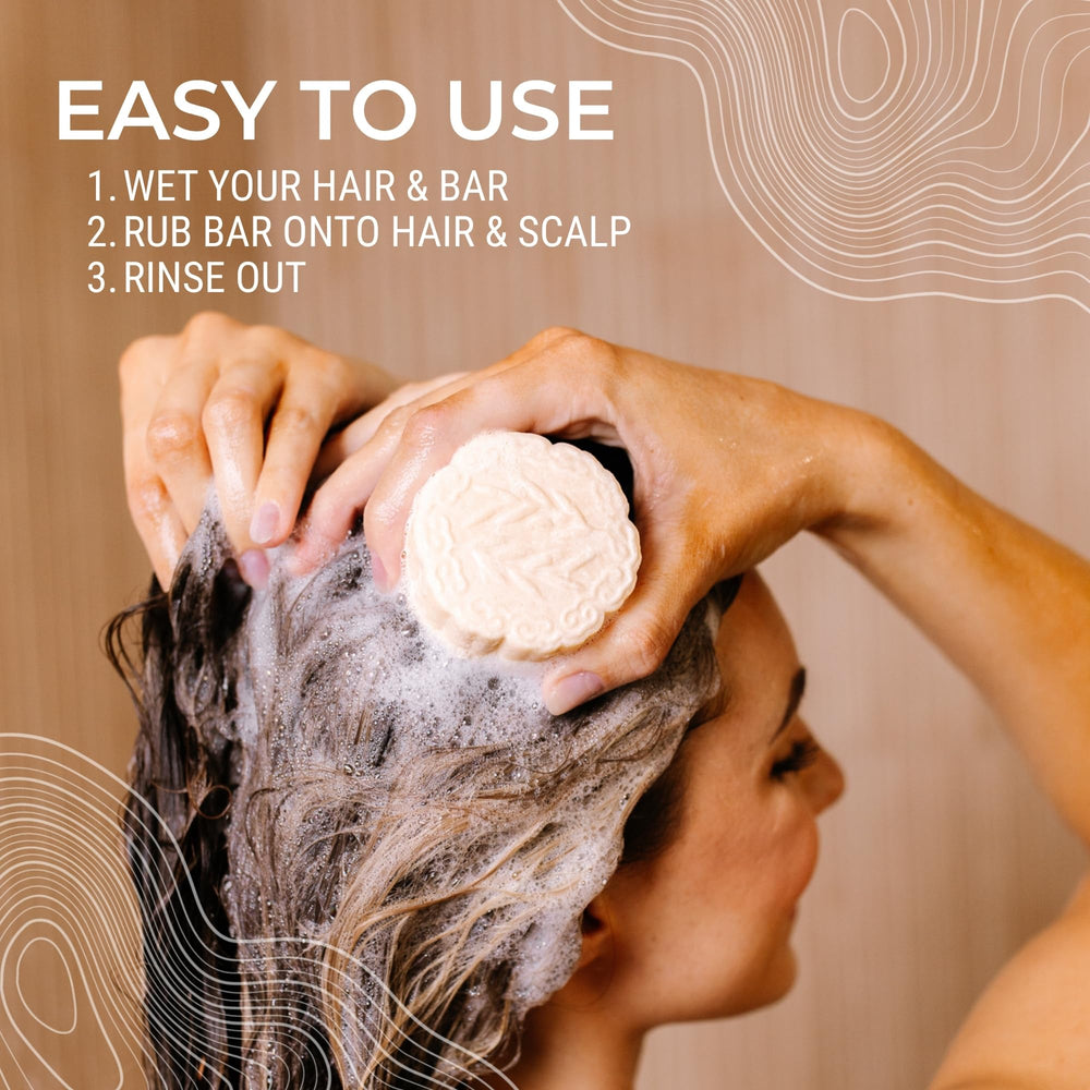 Viori shampoo bar in hand ready for travel, compact and leak-free for convenience