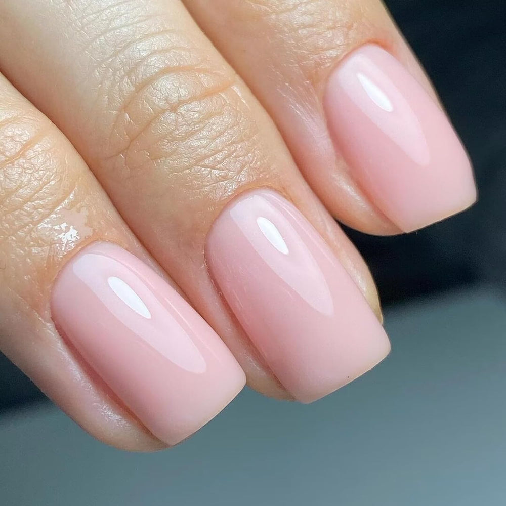 Vishine brush and open bottle showing jelly texture for smooth, even application