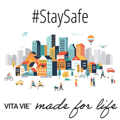 VITA VIE 12 fl oz bottle beside hand to show size and travel convenience