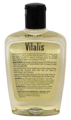 Vitalis tonic poured in hand demonstrating smooth texture for easier detangling and styling
