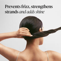 Viviscal texture droplet on hand showing lightweight formula for non-greasy finish.