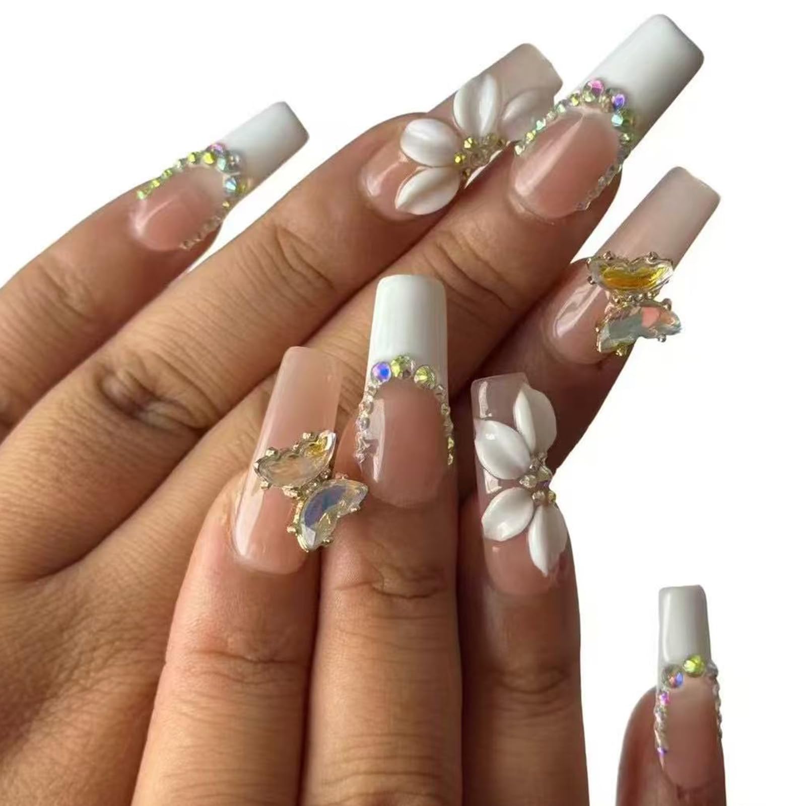 Vlazryk close-up of long square white French tips highlighting classic style