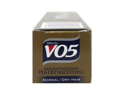 VO5 applied to hair in styling scene demonstrating frizz control and shine