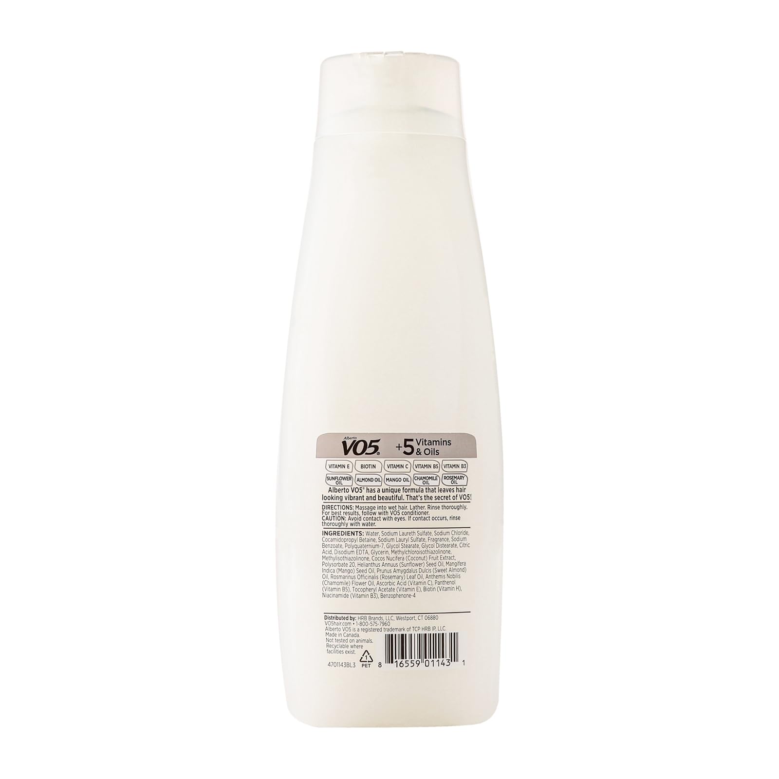 VO5 bottle on bathroom shelf styled with towel and plant, suggests daily tropical routine