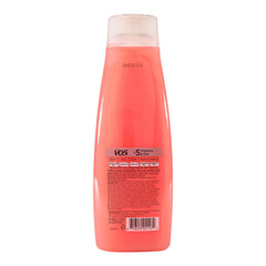 VO5 15 oz bottle held in hand showing scale and travel-friendly size benefit