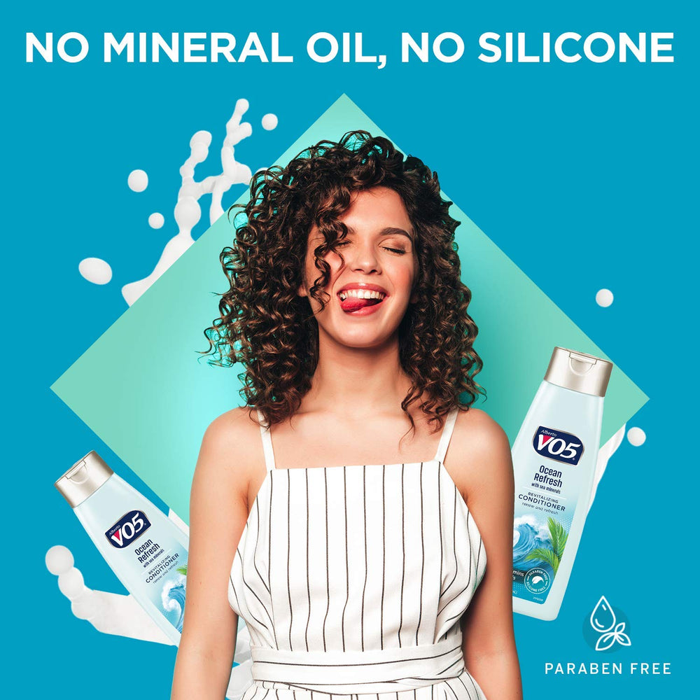 VO5 Ocean Refresh in hand to show 12.5 fl oz scale and travel convenience benefit