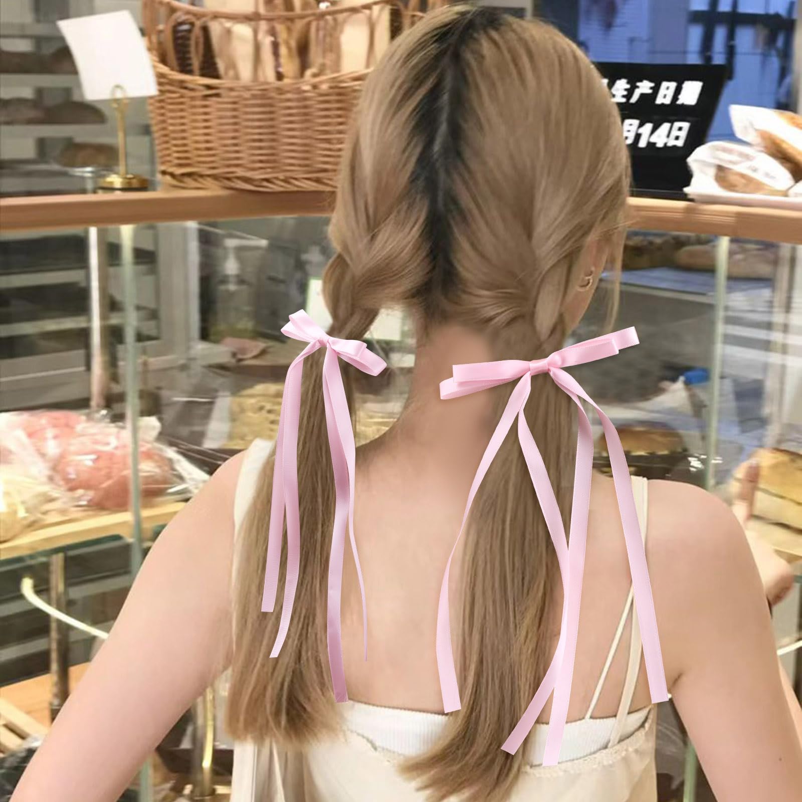 VOBOBE bow in half-up hairstyle illustrating feminine styling versatility