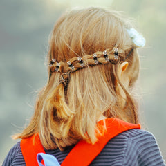 VOCOSTE side view showing metal teeth and secure grip benefit for fine hair