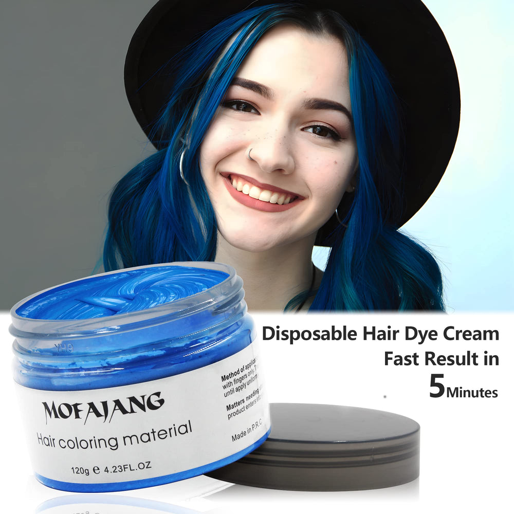 VOLLUCK blue pomade swatched on finger to show pigmented payoff and control