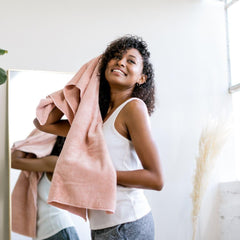 VOLO model wearing towel wrap demonstrating secure fit and anti-frizz