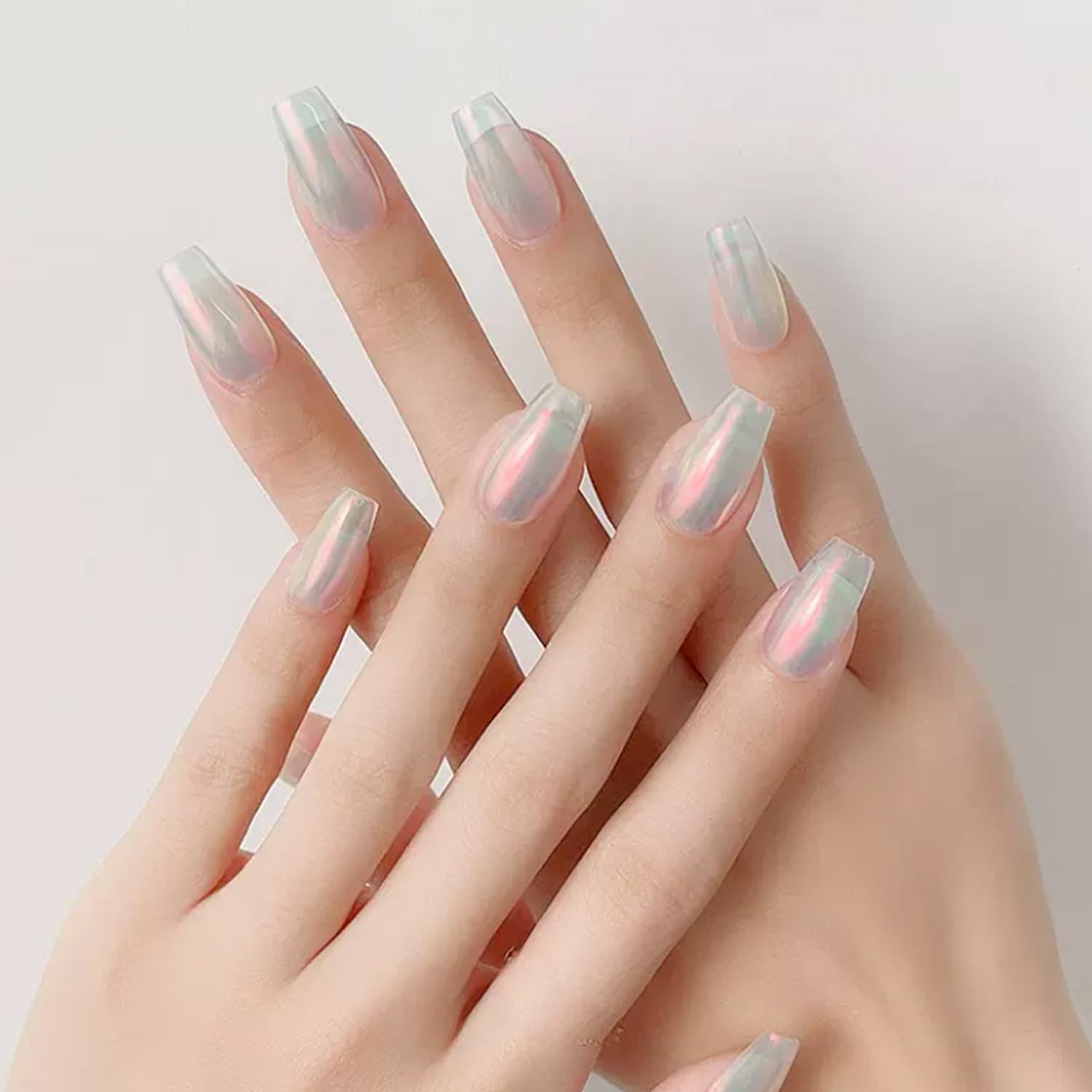 Vonrui finished nail under top coat showing long-lasting glossy chrome benefit