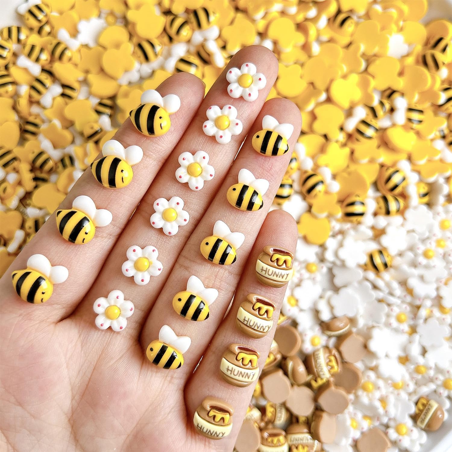 Vopintpy front packaging showing 20 bee flower nail charms and convenience