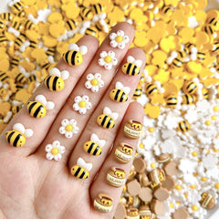 Vopintpy front packaging showing 20 bee flower nail charms and convenience