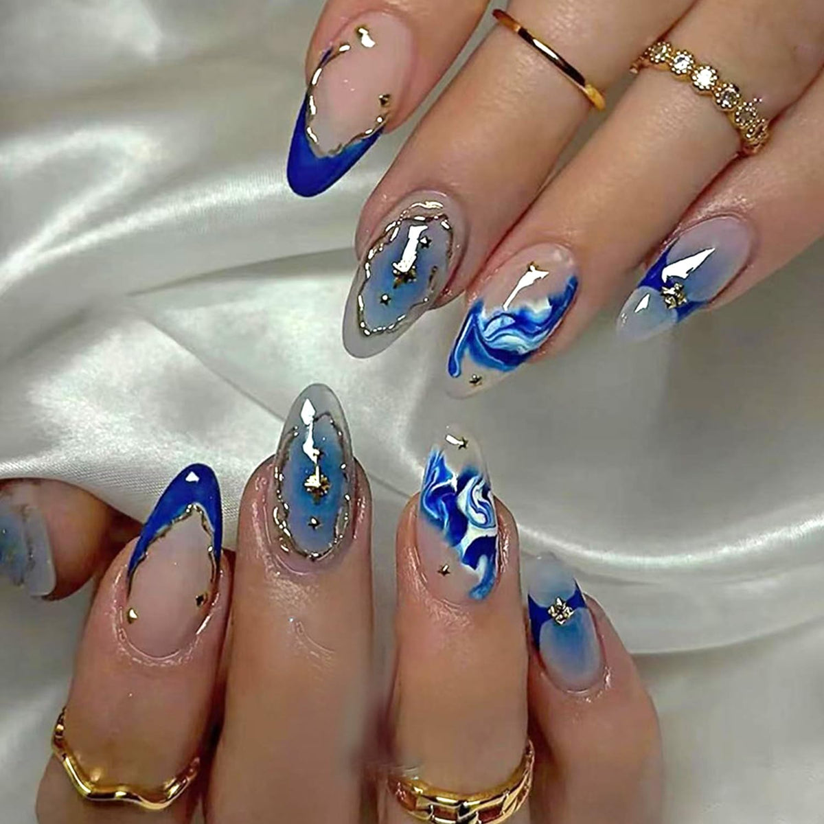 Vopintpy front packaging showing 24-piece blue marble almond nails and tools for easy styling