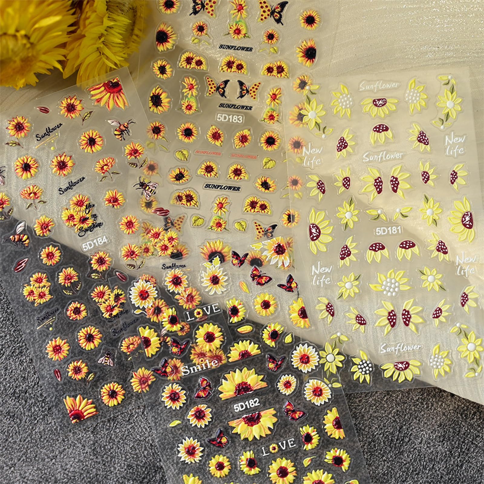 VOTACOS finished autumn sunflower manicure on hands, showcases style