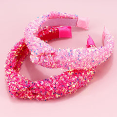 Vovii side profile of knotted headband showing knot shape and secure fit benefit