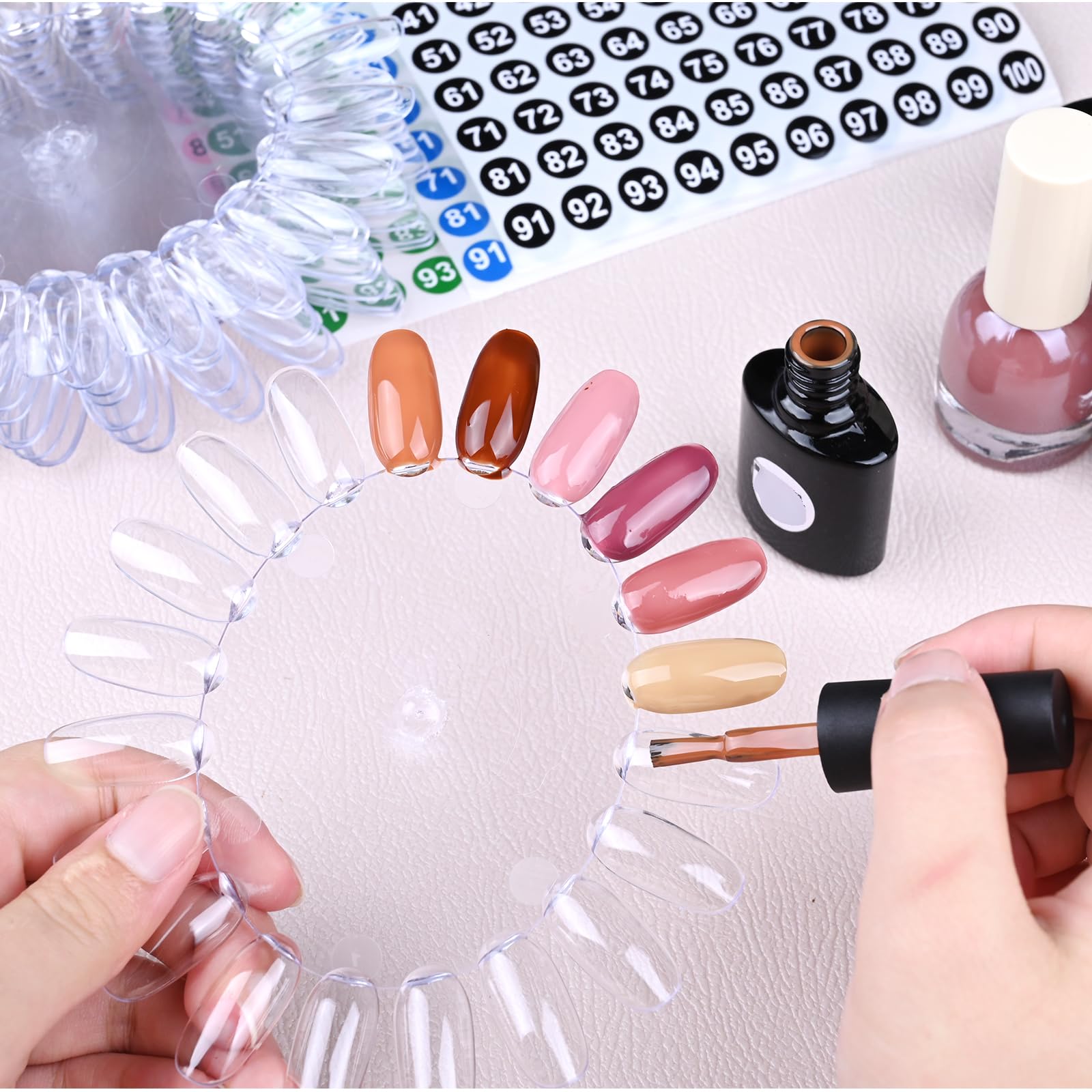 Vukasi swatch wheel in use on salon counter aiding quick client color choice