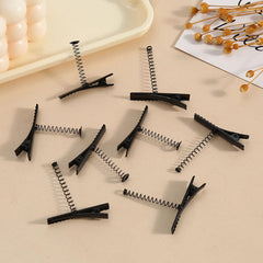VYNFLICK clips arranged as party favors showing versatile gifting use