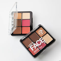 W7 bronzer swatched on skin showing warm definition