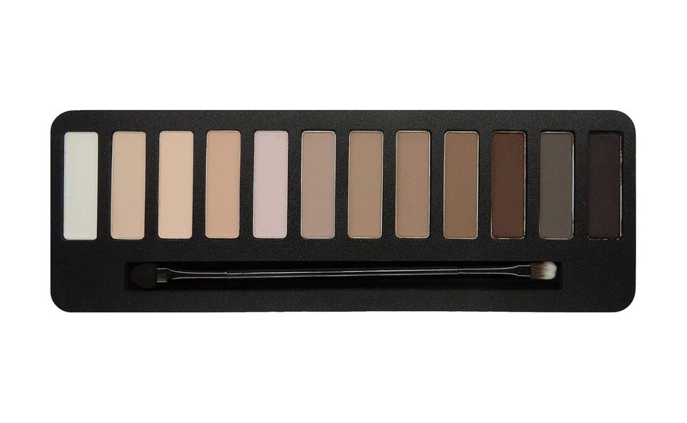 W7 palette in hand for scale showing travel-friendly compact size