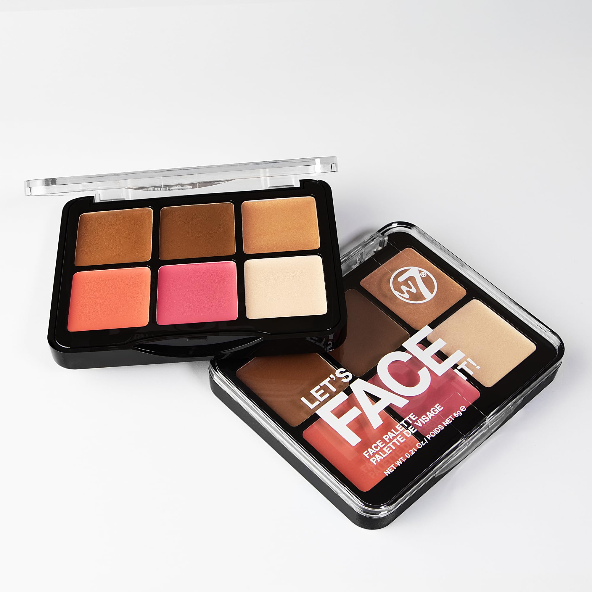 W7 palette in hand illustrating compact size and portability