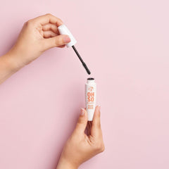 W7 mascara tube held in hand showing scale and portable size