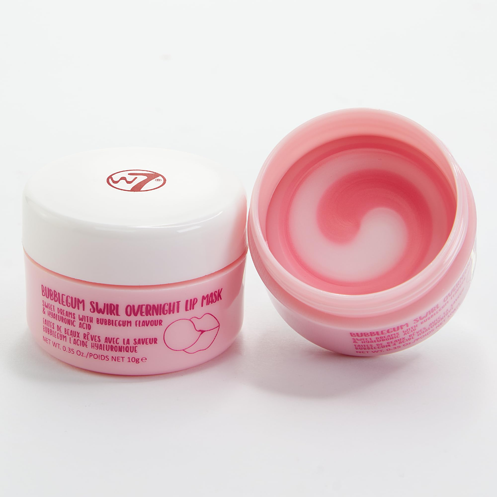 W7 Watermelon mini tub held in hand to show compact travel size and portability