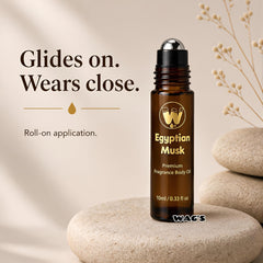 Applying WagsMarket Egyptian Musk on wrist for subtle, long-lasting personal scent