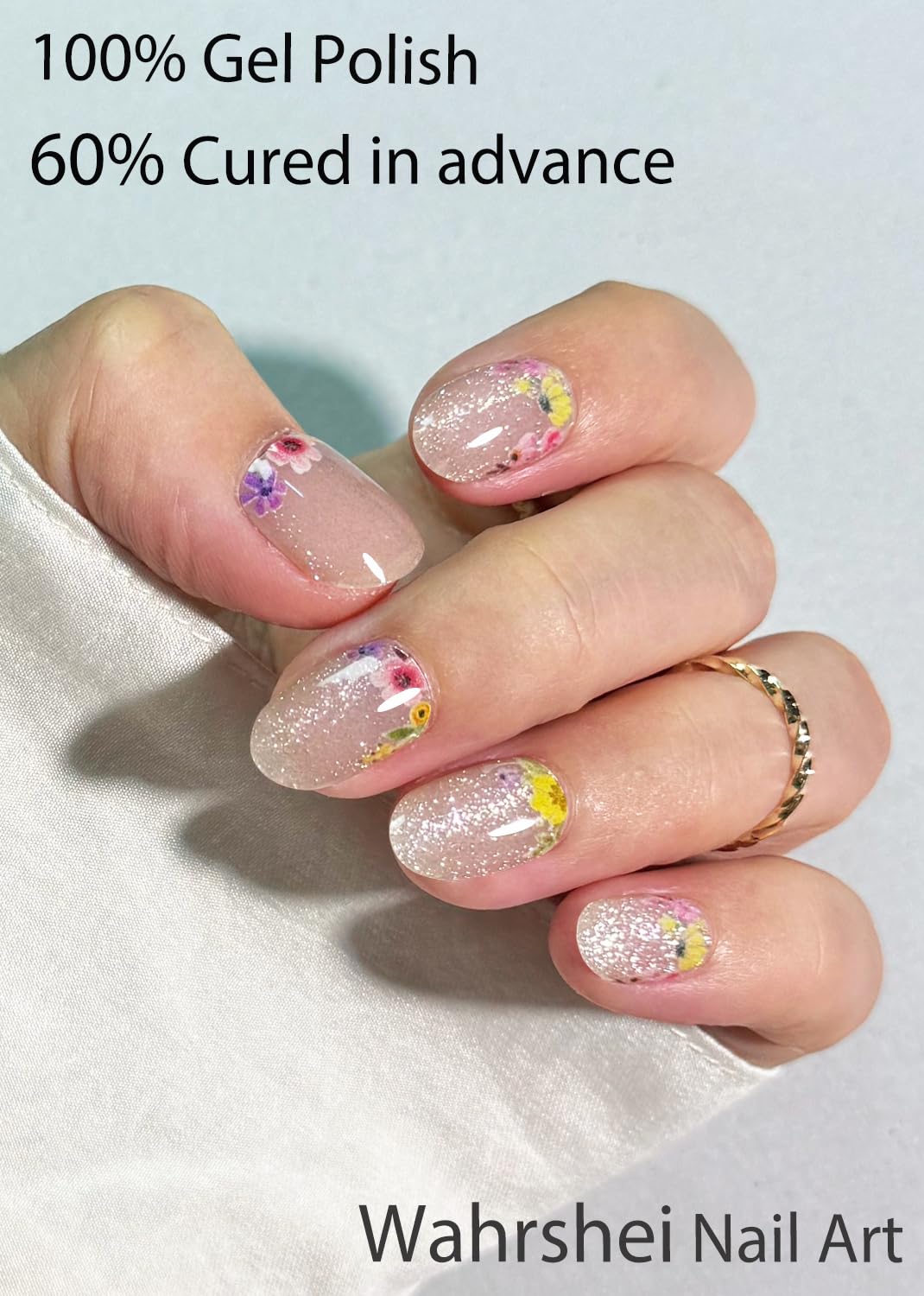 Wahrshei applying gel sticker on nail demonstrating easy DIY