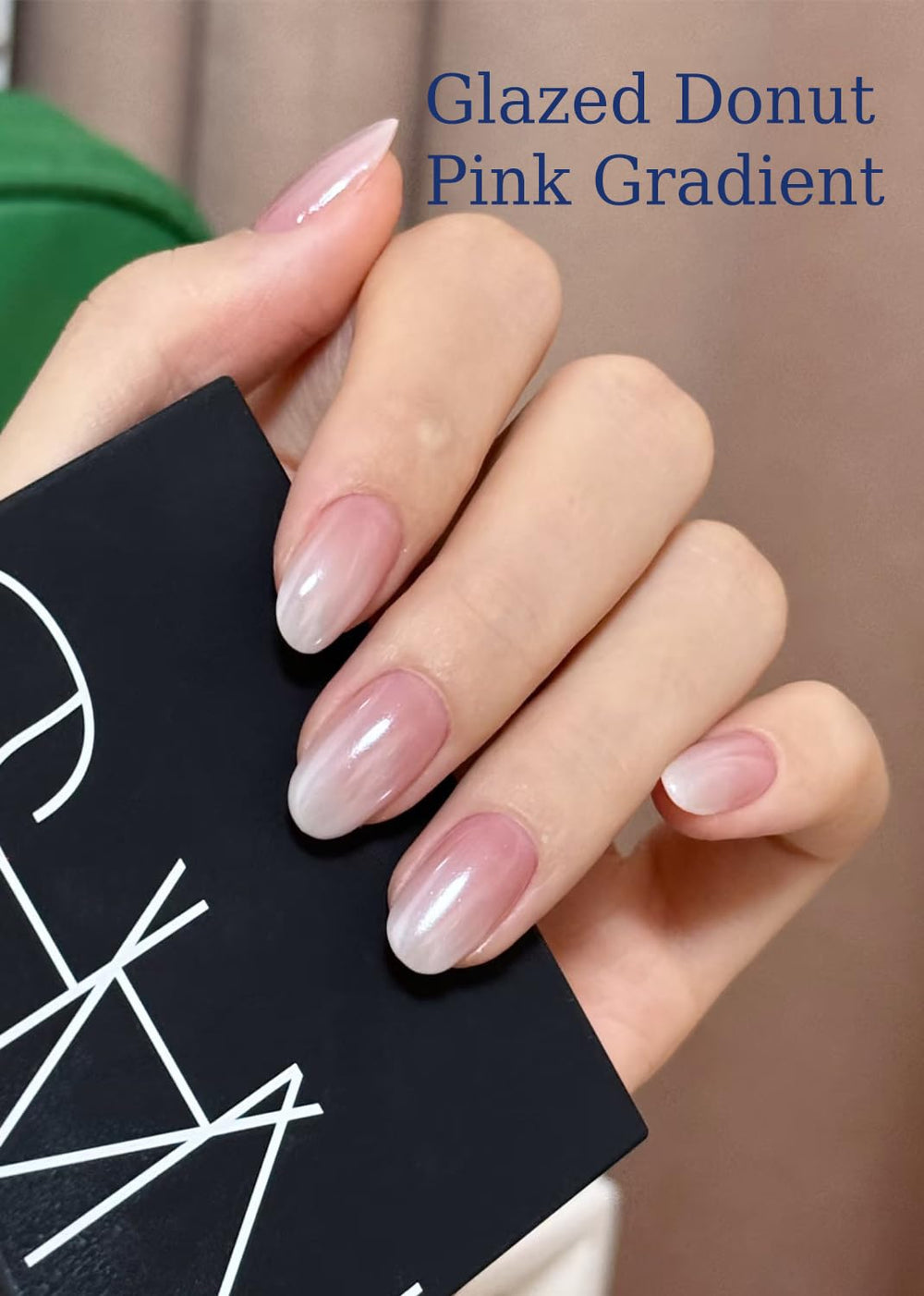 Wahrshei on hand model showing salon-quality pink gradient and chip resistance