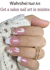 Wahrshei applied on nails in use showing salon-style floral French result